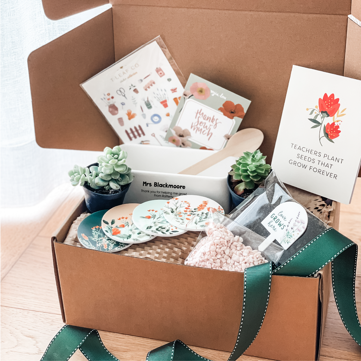 Gift box including cards, a personalised rectangle ceramic planter pot, a succulent and a set of 4 fridge magnets.